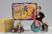 TWO TIN RIDING TOYS Both boxed