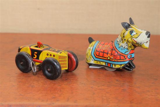 TWO TIN WIND UP TOYS. Both