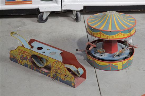 TWO TIN WIND-UP TOYS. Both are