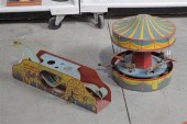 TWO TIN WIND-UP TOYS. Both are