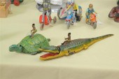 TWO TIN WIND-UP TOYS. One of a