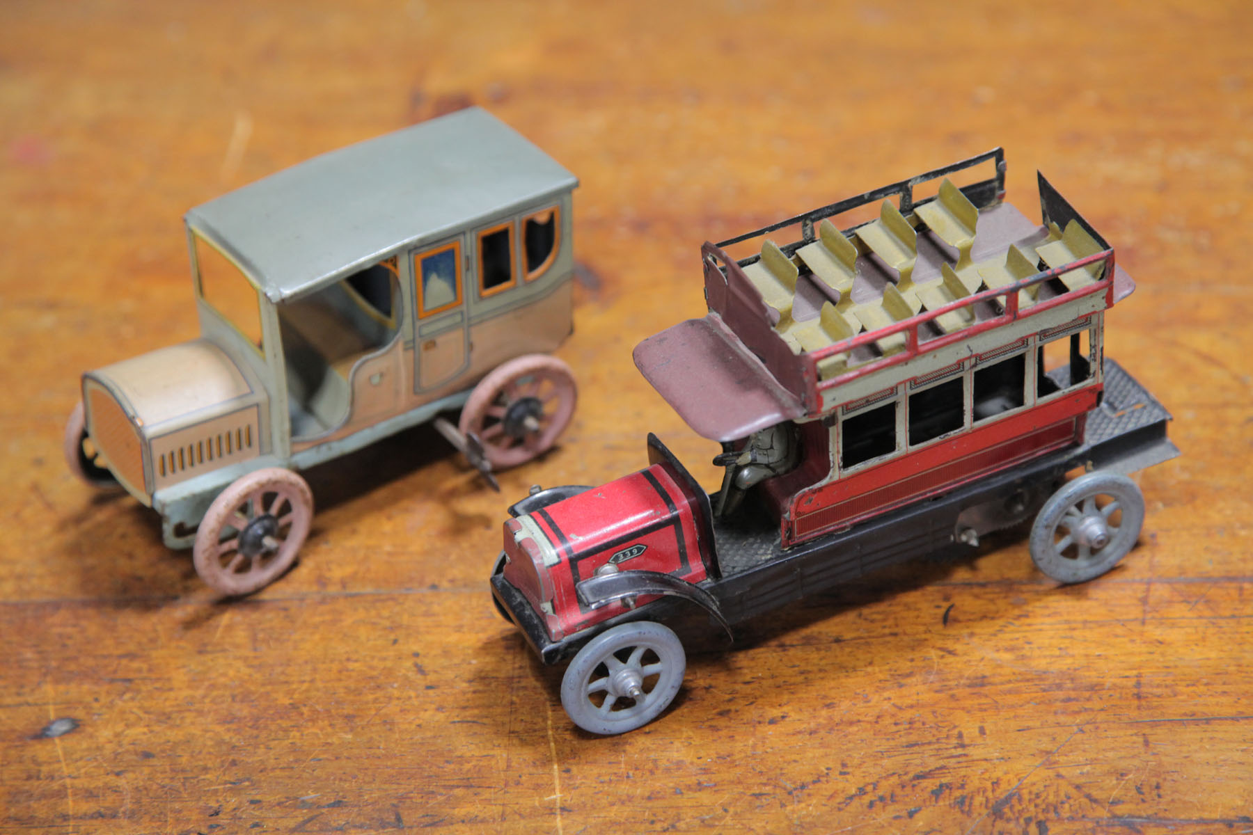 TWO TIN WIND-UP VEHICLES. 