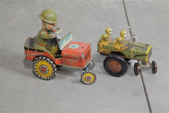 TWO TIN WINDUP TOYS. Unique Art