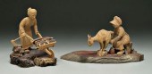 Two Tom Wolfe carvings: woman