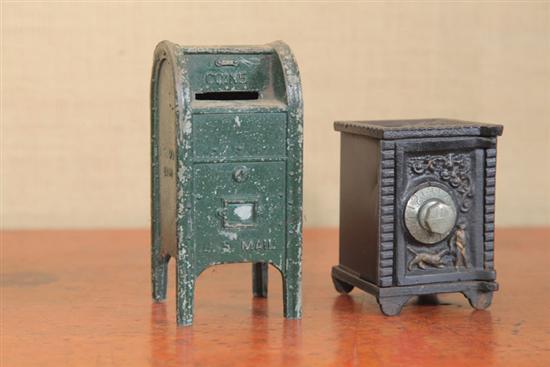 TWO TOY BANKS. One painted black in