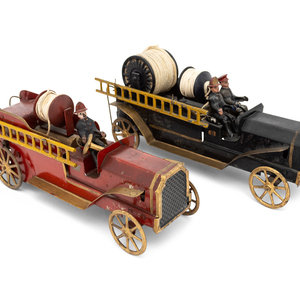 Two Toy Models of Fire Trucks Early