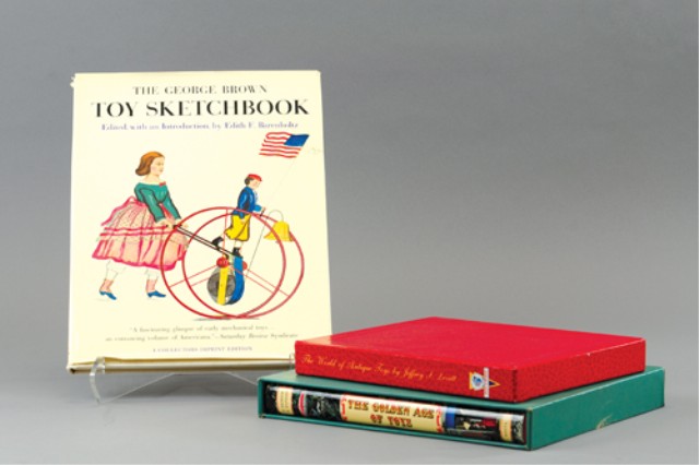 TWO TOY REFERENCE BOOKS WITH GEORGE