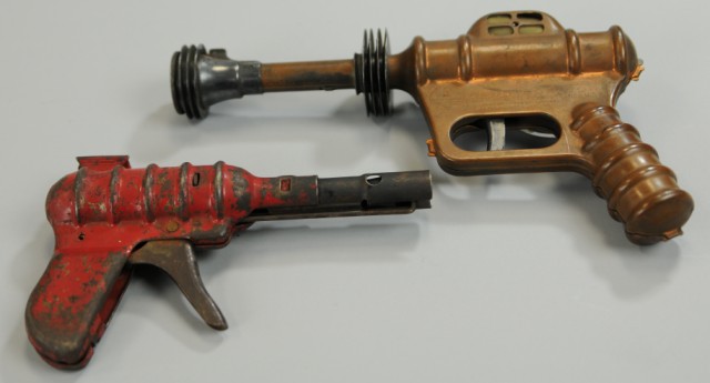TWO TOY SPACE PISTOLS Includes