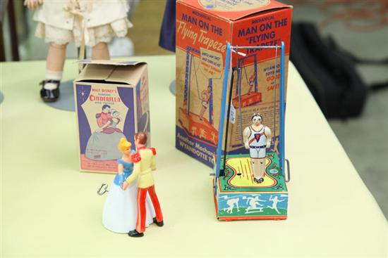 TWO TOYS. A tin Wyandotte ''Man