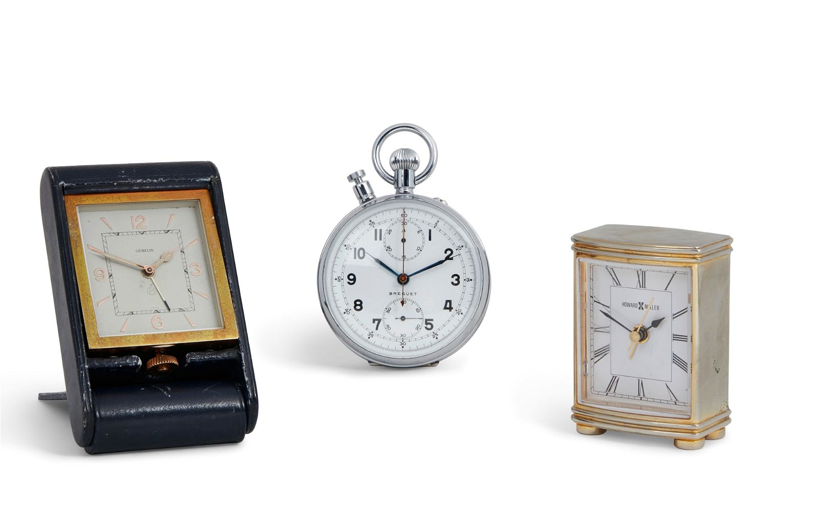 TWO TRAVEL CLOCKS AND A