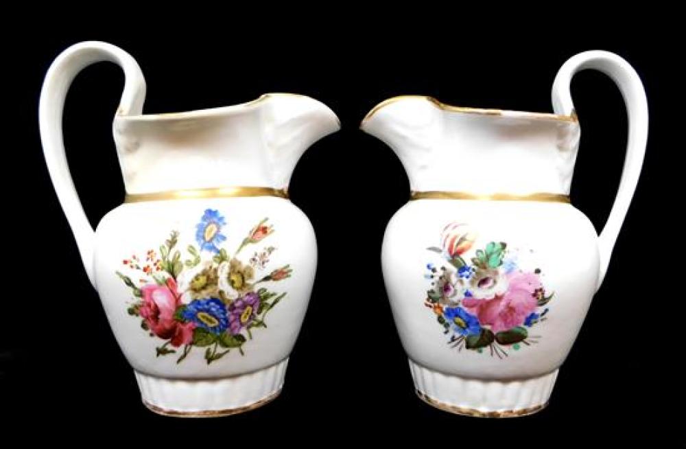 TWO TUCKER PITCHERS,