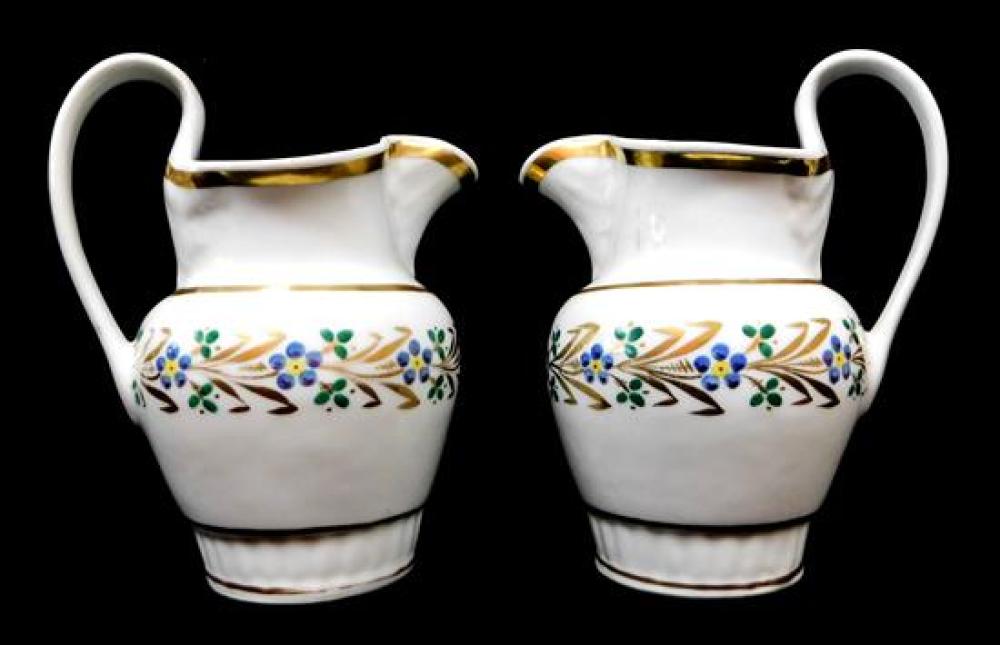 TWO TUCKER PORCELAIN VASIFORM