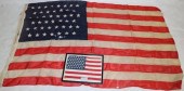 TWO UNITED STATES FLAGS. TO IN