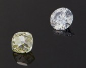 TWO UNMOUNTED COLORED DIAMONDS