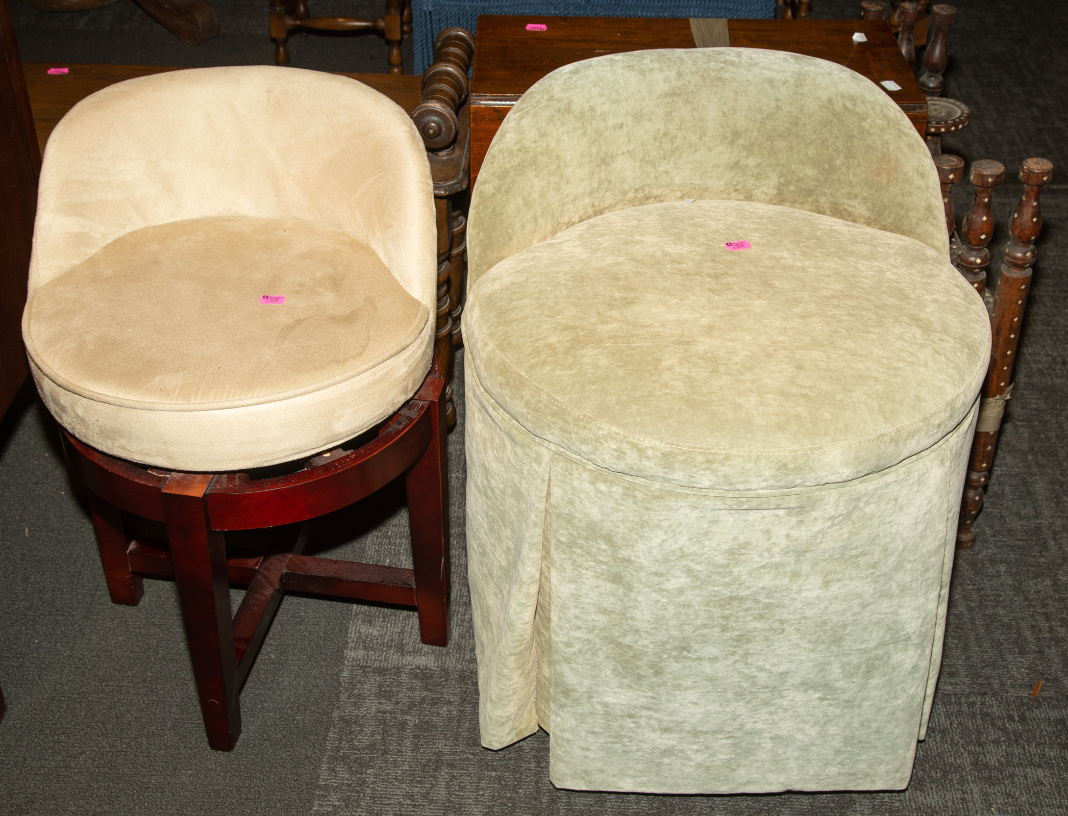 TWO UPHOLSTERED SWIVEL STOOLS &