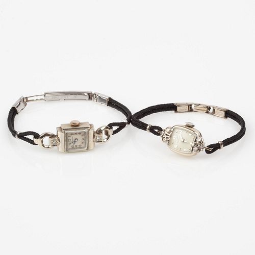 TWO VINTAGE 14K DIAMOND WATCHESLady