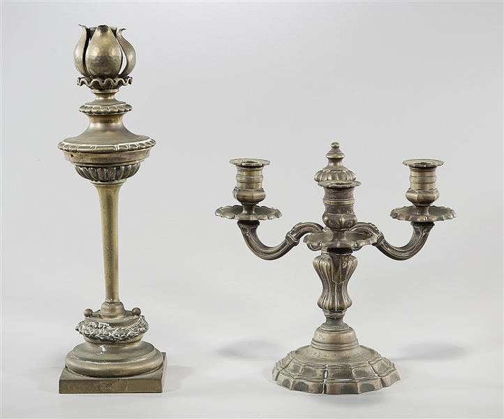 Two vintage brass candlesticks; one