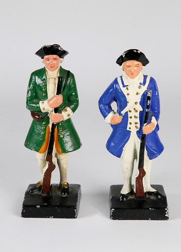 TWO VINTAGE CAST IRON PAINTED