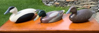 Two vintage decoys, including: