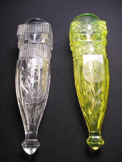 Two vintage glass automobile bud