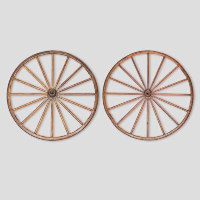 TWO WAGON WHEELSTwo wooden wagon