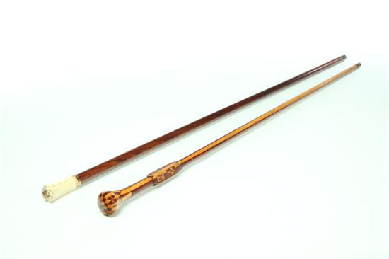 TWO WALKING STICKS.  American  1872