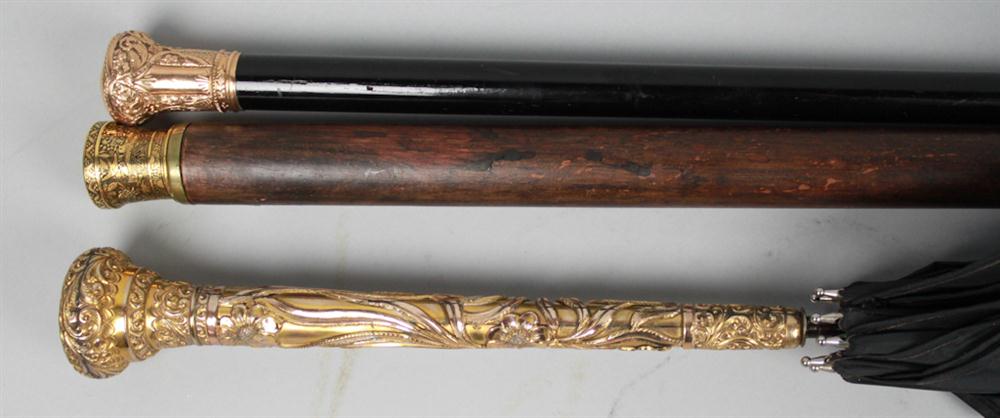 TWO WALKING STICKS AND AN ART