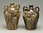 Two Walter Fleming face jugs: