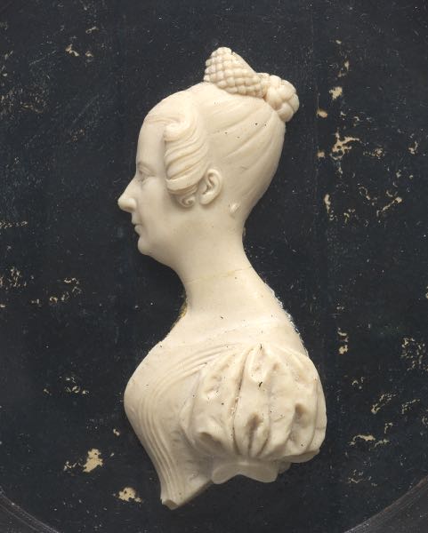TWO WAX PORTRAITS OF WOMEN  One