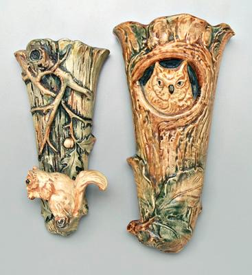 Two Weller wall pockets: one with