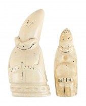 TWO WHALE'S TEETH CARVED IN BI