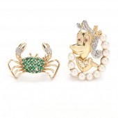 TWO WHIMSICAL GOLD AND GEM-SET
