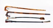 TWO WOOD HORSE HEAD CANES AND