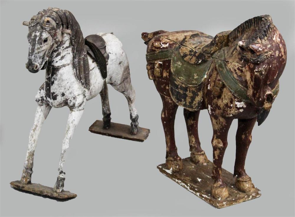 TWO WOOD MODELS OF CAPARISONED