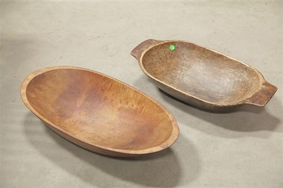 TWO WOODEN BOWLS. Butter bowls or