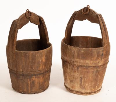 Two wooden pails, the larger 63cm