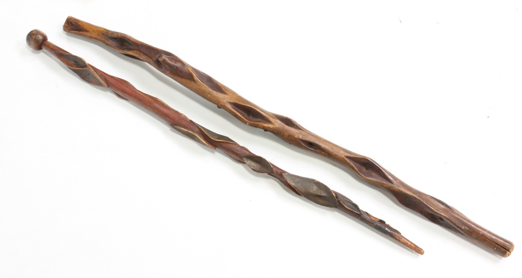 TWO WOODEN WALKING STICKS.