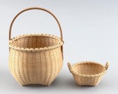 TWO WOVEN BASKETS BY JOAN CASH