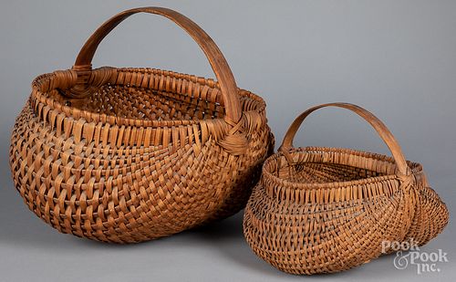 TWO WOVEN BASKETSTwo woven baskets,