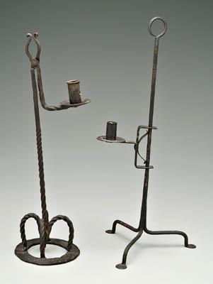 Two wrought iron candleholders: one