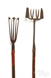 TWO WROUGHT IRON EEL GIGSTwo w