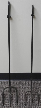 TWO WROUGHT IRON HEARTH TOOLST