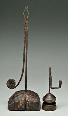 Two wrought iron light holders: one