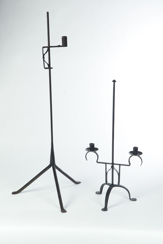 TWO WROUGHT IRON LIGHTING DEVICES.