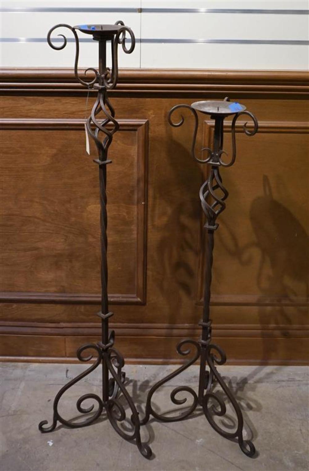 TWO WROUGHT IRON PRICKET