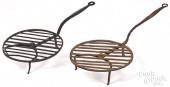 TWO WROUGHT IRON ROTATING BROI