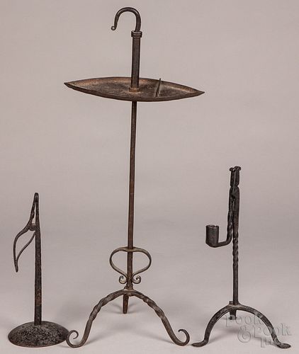 TWO WROUGHT IRON RUSH LIGHTS, EARLY