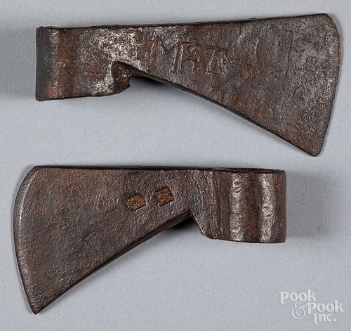 TWO WROUGHT IRON TRADE AXESTwo