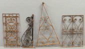 Two wrought iron window grates