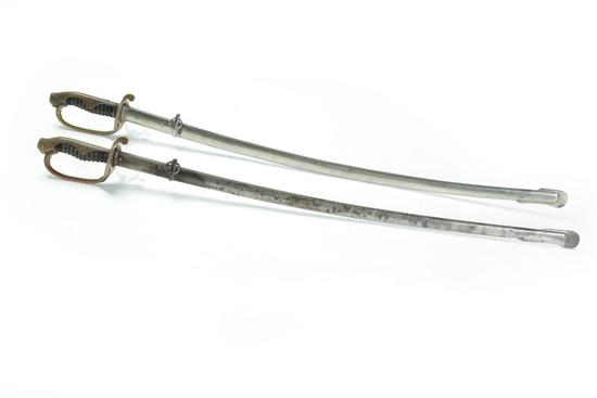 TWO WWII JAPANESE SWORDS.  Almost